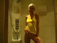 Sexy skinny blonde is making herself wet in the bathroom