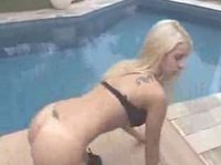 Young blonde slut is experiencing her first DP by the pool