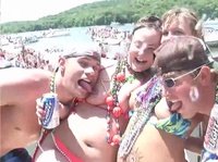 A crazy young dude licks his girlfriend's pussy with his friends hanging out around them