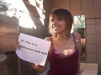 A teen chick is playing a dare game and flashes her tits
