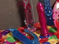 This nerdy girl's toy collection deserves admiration, not to mention her bushy pussy