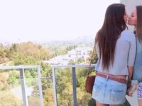 Kissing on a balcony leads to more fun for those young girls