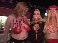 Mature ladies paint on their huge tits