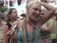 Mature ladies are not shy to show off their big tits at a street parade