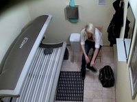 Spying on a blond cutie at the tan salon